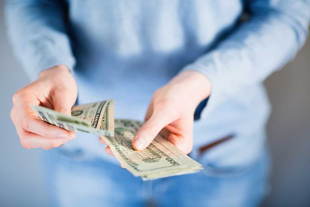 Understanding The Risks Paying Employees In Cash